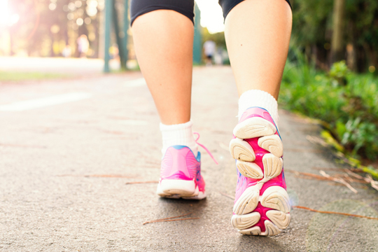 a patient walking in supportive shoes